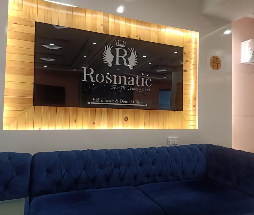 Modern hospital reception area with a white desk